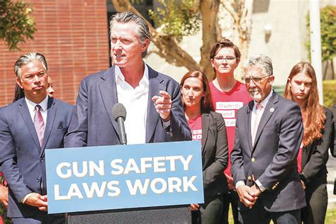 Newsom signs gun laws that add new taxes and limit where owners can ...