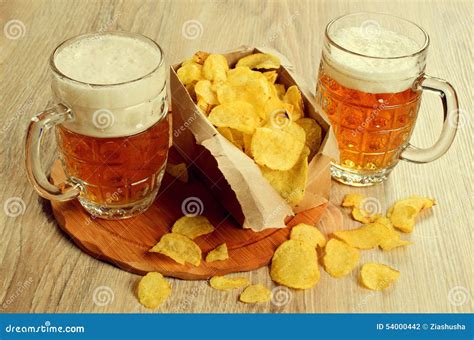 Beer and chips stock photo. Image of evening, froth, cool - 54000442