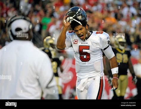 Tampa Bay Buccaneers head coach Raheem Morris, left, attempts to calm ...