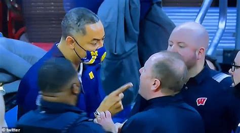 Michigan coach Juwan Howard appears to throw punch at Wisconsin assistant, brawl breaks out ...