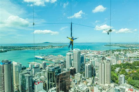 Bungee jumping man from Auckland sky tower. Stock Photo | Adobe Stock