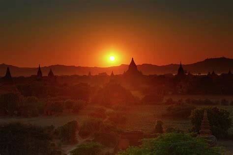 Temples silhouette in Bagan at sunset Photograph by Mikhail ...