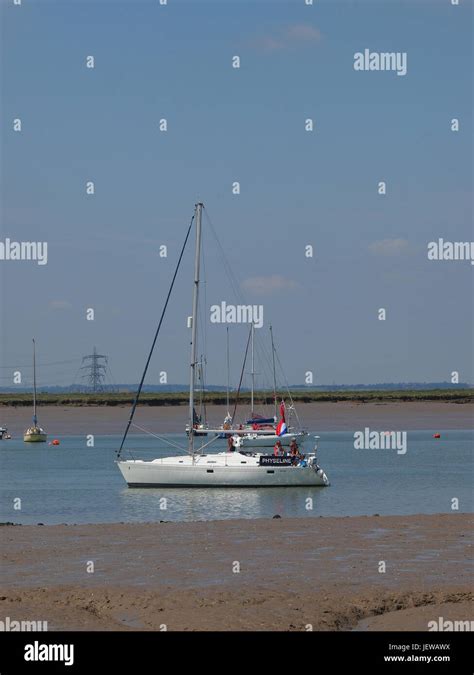 Yacht in Queenborough Harbour Stock Photo - Alamy