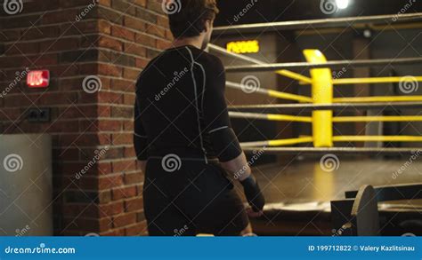 Strong Fit Man Walking Up Stairs at Gym. Boxer Getting Ready for Fight in Club Stock Photo ...