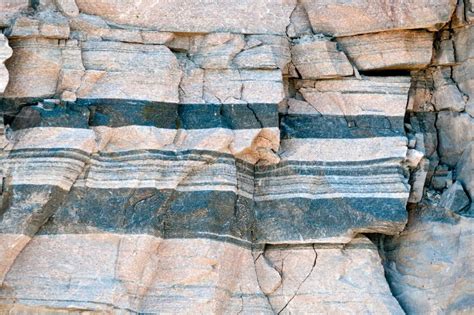 Layered gneiss rock stock photo. Image of geology, physical - 25551610