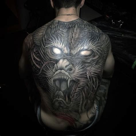 3D style amazing looking whole back tattoo of creepy dragon - Tattooimages.biz