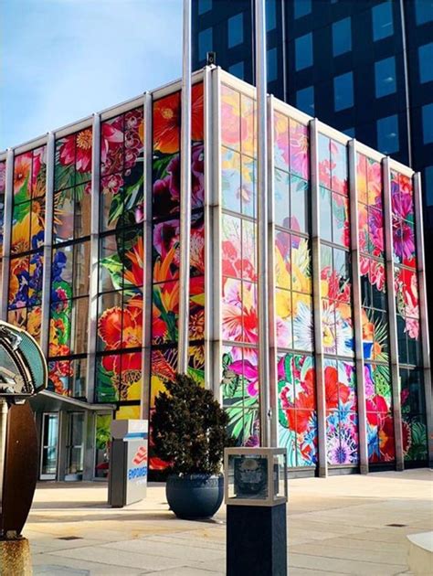 Chase Bank building in Milwaukee, covered with flowers : r/bizarrebuildings