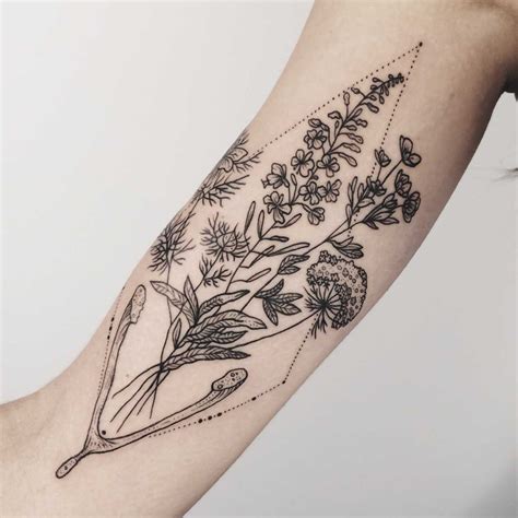 Flora of Alaska and wishbone tattoo by Pony Reinhardt - Tattoogrid.net