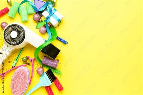 Hairdresser's tools and Christmas decor on color background Stock Photo ...