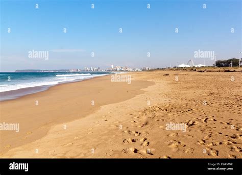 DURBAN, SOUTH AFRICA - JUNE 12, 2015; Empty Blue Lagoon Beach against ...