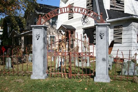 our front yard "cemetery" gates | Halloween graveyard, Halloween yard ...