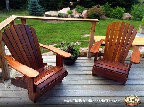 Pair of dark western red cedar Adirondack chairs stained with cetol 1 by Sikkens on deck ...