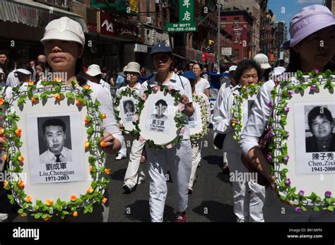 Members of Falun Dafa (Falun Gong) from around the world parade through ...