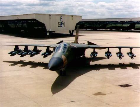 An RAAF General Dynamics F-111C Aardvark fully loaded with bombs sits ...