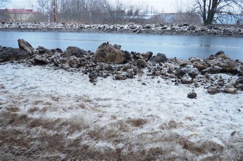 Snow, Ice, Slush and Winter Mud at a Pedestrian Crossing. the Air ...