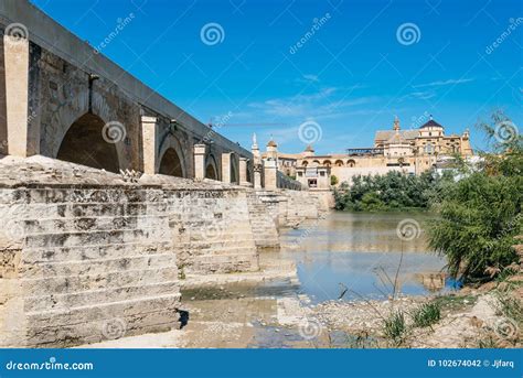 Roman Bridge Over Guadalquivir River Editorial Photography - Image of city, guadalquivir: 102674042