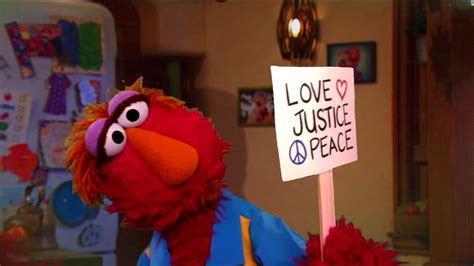 Elmo and his dad Louie talk about racism and why people protest - CNN Video