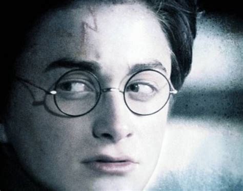 a harry potter quote with the image of her face and glasses in front of it