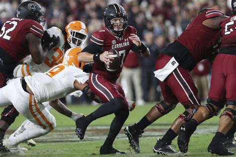 South Carolina runs over No. 5 Tennessee 63-38; Hooker hurt | AP News