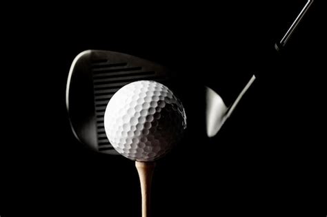 Premium Photo | Closeup of golf club and golf ball on tee