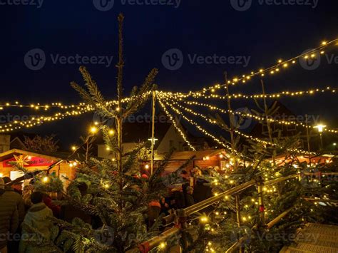 christmas market in a german village 16281312 Stock Photo at Vecteezy