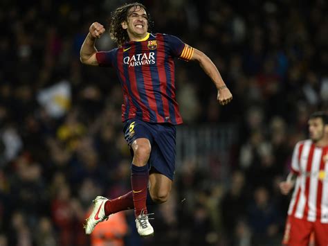 Carles Puyol: The raggy-haired Barcelona defender who even gained the ...