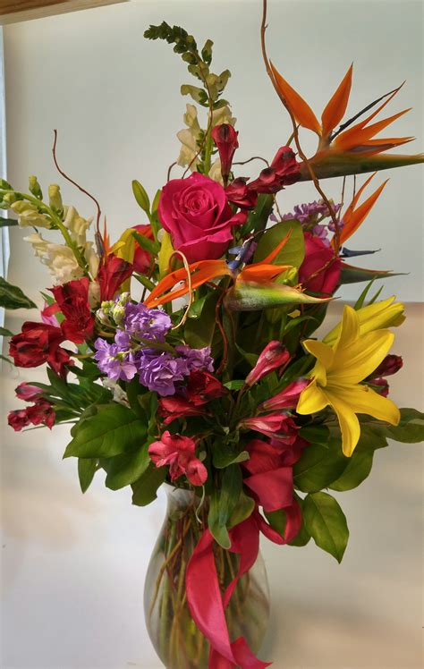 Tall mixed arrangement featuring some tropical flowers. in Slidell, LA | Petals & Stems Florist