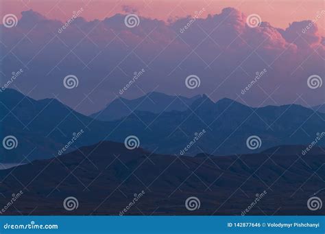 Purple Sunset in the Mountains. Evening Landscape in a Hilly Area with ...