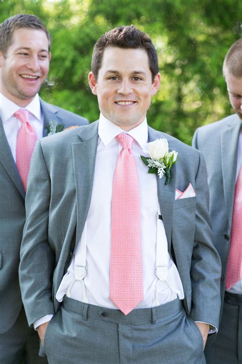 Groom in a Gray Suit and a Pink Tie with Groomsmen