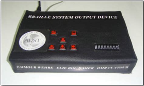 The Design and Development of a Multi-Lingual Braille System Output Device with Audio Enhancement