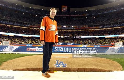 Anaheim Ducks owner Henry Samueli poses for a photo near the pitchers ...