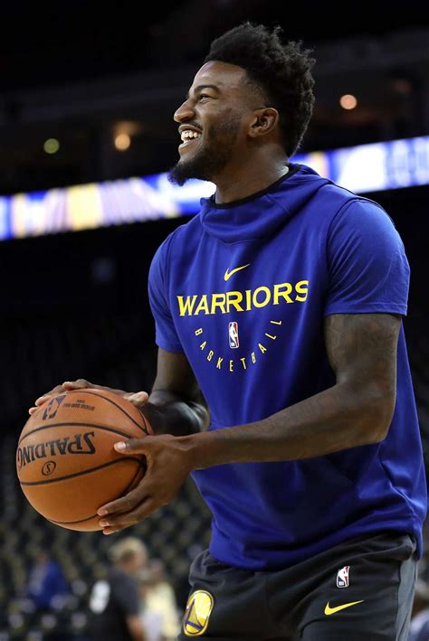 Warriors' Jordan Bell kisses fan who got nailed by ball