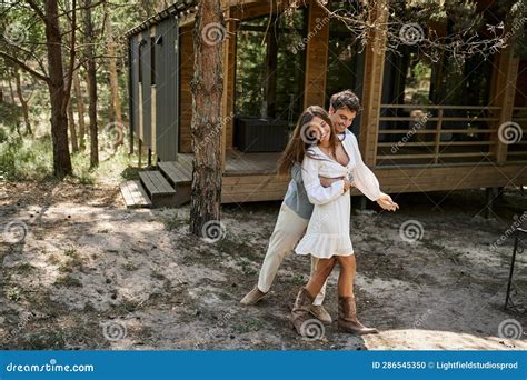 Happy Man Hugging Woman and Smiling Stock Photo - Image of girlfriend, cheerful: 286545350