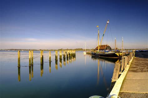 Sunrise Over Bosham Harbour and Village, West Sussex, UK Stock Photo - Image of spring, jetty ...