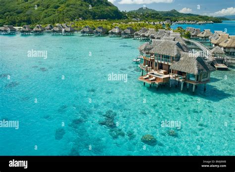 Overwater bungalows of Hilton bora Bora Nui Resort hotel in Bora bora ...