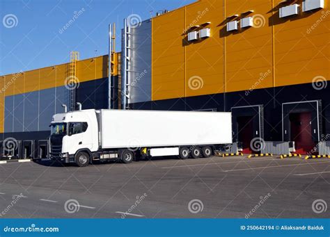 Modern Logistics Complex. Unloading Trucks in a Modern Warehouse Stock Photo - Image of truck ...