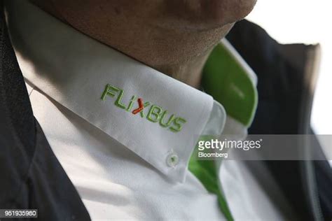 The FlixBus logo sits on a bus driver's shirt collar at Munich... News Photo - Getty Images