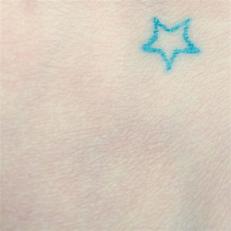 Tiny blue star tattoo perfect! On right shoulder blade | Tattoos, Star tattoos, Cute tattoos