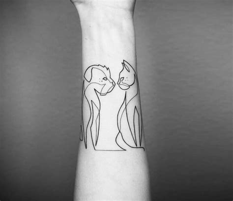 Cat and dog tattoo by Mo Ganji | Photo 30292