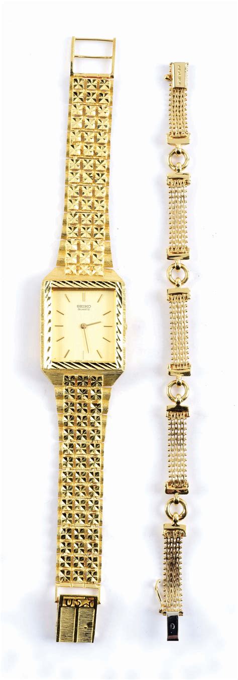 Lot Detail - LOT OF 2: 14K GOLD WATCH W/BAND AND BRACELET.