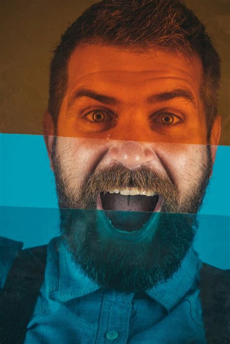 Positive Face Expression Bearded Man Behind Colored Glass. Fashion Man in Denim Shirt with ...