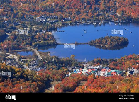Aerial close-up view of Mont Tremblant resort and lake with autumn color leaf, Quebec, Canada ...