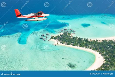 Sea Plane Flying Above Maldives Islands Stock Image - Image of landscape, sunshine: 67534701