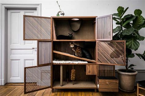 Modern Cat House Gives Cats 10 Fun Things |Design Milk | Cat flats, Pet furniture, Contemporary ...