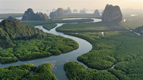 Aerial view of Phang nga bay mountains and rainforest at sunset ...