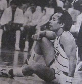 Ginebra San Miguel playing-coach Robert Jaworski, a rest on the floor ...