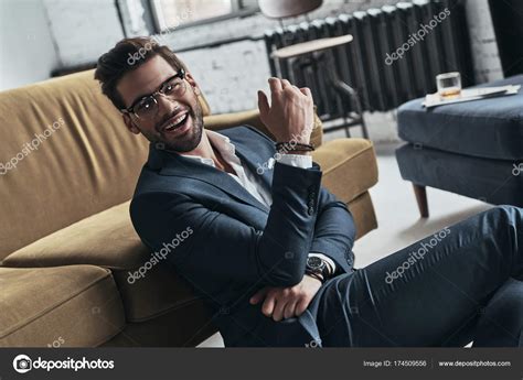 Laughing man in full suit Stock Photo by ©gstockstudio 174509556