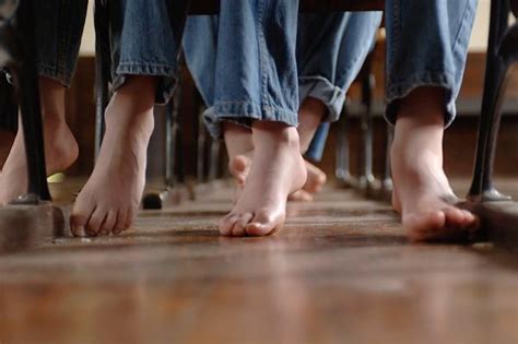 Fifth graders from the Good Shepherd Lutheran School in Columbia sit barefoot during a day of ...