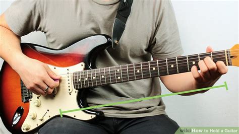 How to Hold a Guitar: 12 Steps (with Pictures) - wikiHow