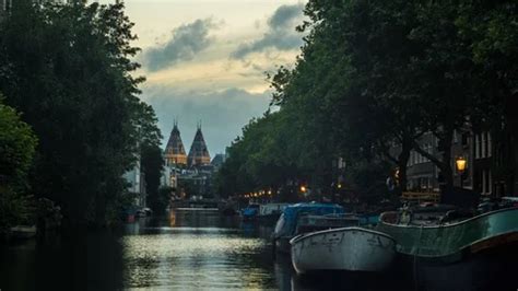 Timelapse of Amsterdam Canal with Museum... | Stock Video | Pond5